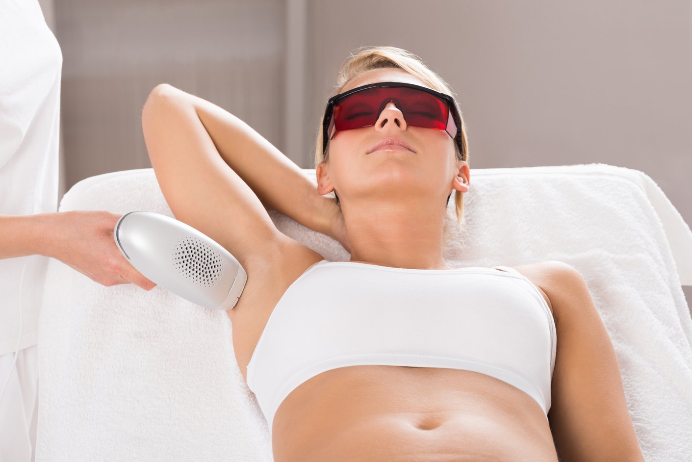 Woman Having Underarm Laser Hair Removal Treatment